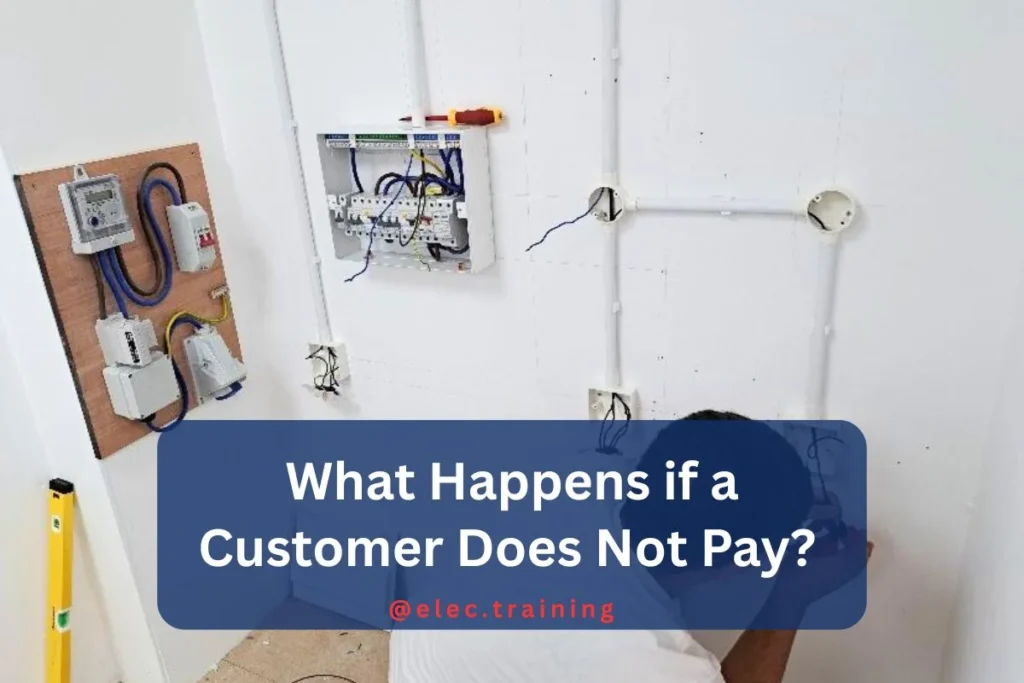 A man is installing electrical wires on a wall, focused on his work with tools in hand