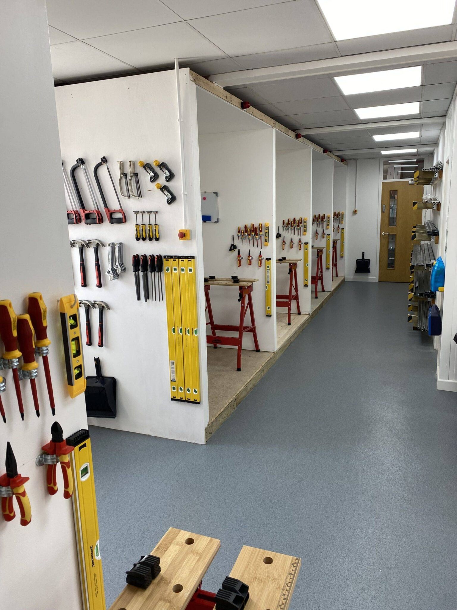 Individual bays and neatly arranged hand tools on the walls in Derby centre