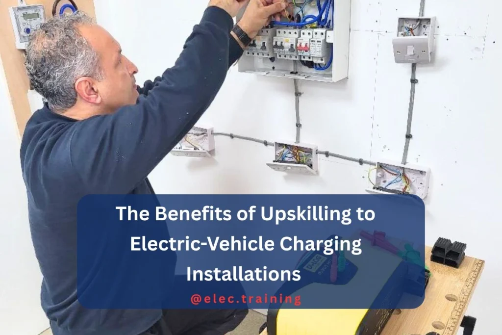 learner kneeling while working on electrical panel, surrounded by tools on a workbench.