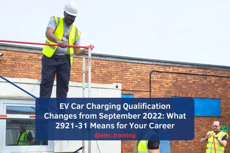 Learners using scaffold to safely install wiring at height