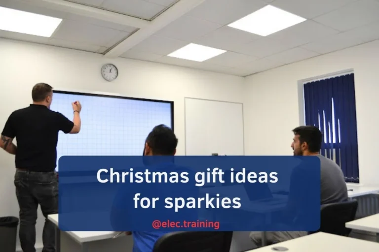 Trainer giving lecture on white board for electrical training