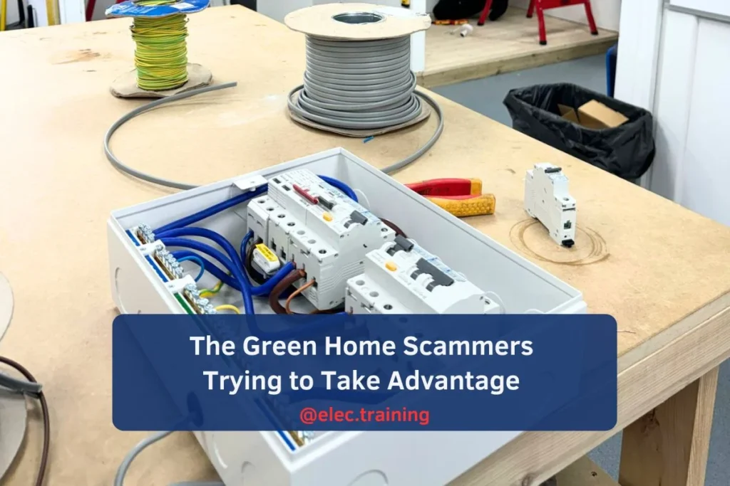 Consumer unit on table surrounded by wires and hand tools for training use