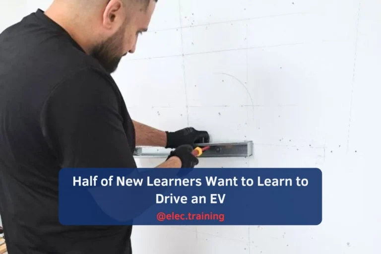 Trainee wiring a light switch during NVQ 2357 course