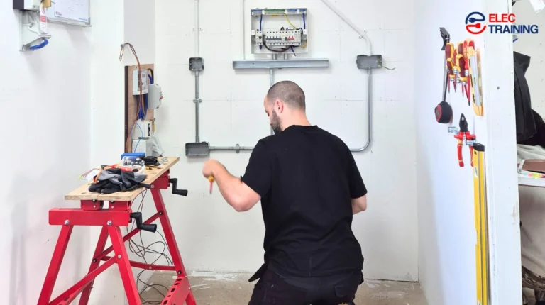 Qualified electrician in their 40s demonstrating successful mid-career change into electrical trade